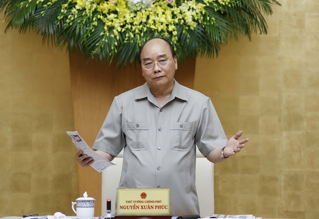 Thủ tướng Nguyễn Xuân Phúc: Bảo vệ sức khỏe nhân dân nhưng không để đổ gãy kinh tế - Ảnh 1.