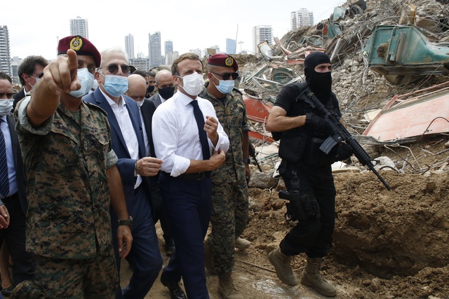 Tổng thống Pháp tới Beirut, cam kết hỗ trợ Lebanon khắc phục hậu quả vụ nổ - Ảnh 3.
