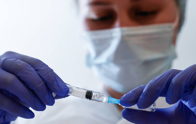 Nga thử nghiệm vaccine kết hợp ngừa COVID-19 và cúm mùa - Ảnh 1.