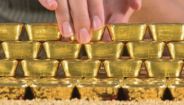 Giá vàng tăng kỷ lục, sát ngưỡng 60 triệu đồng/lượng - Ảnh 1.