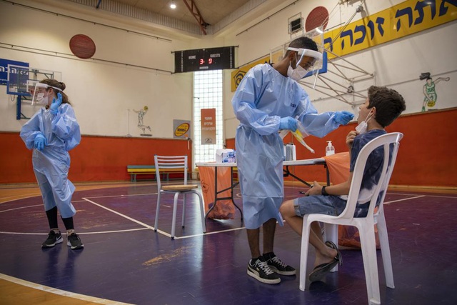 Israel tiêm vaccine ngừa COVID-19 của Pfizer-BioNTech cho trẻ từ 5-11 tuổi - Ảnh 1.