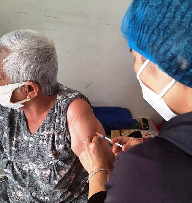 TP Hồ Chí Minh: Đi từng ngõ, gõ cửa từng nhà tiêm vaccine phòng COVID-19 - Ảnh 1.