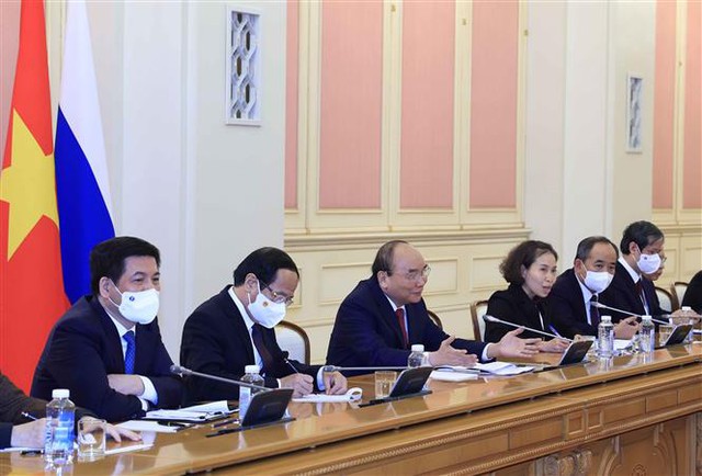 Chủ tịch nước Nguyễn Xuân Phúc hội kiến Thủ tướng Liên bang Nga - Ảnh 4.