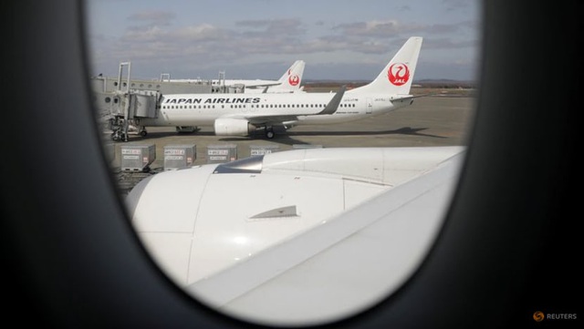 Nhật Bản hủy hơn 100 chuyến bay do tuyết rơi dày - Ảnh 1.