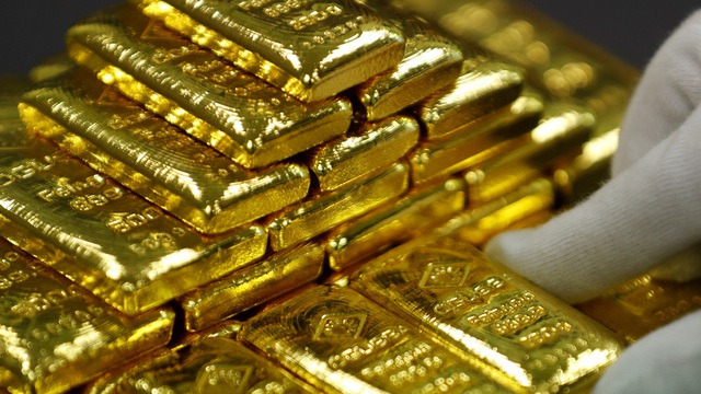 Giá vàng châu Á tăng sau khi chạm mức thấp của hơn 7 tháng - Ảnh 1.