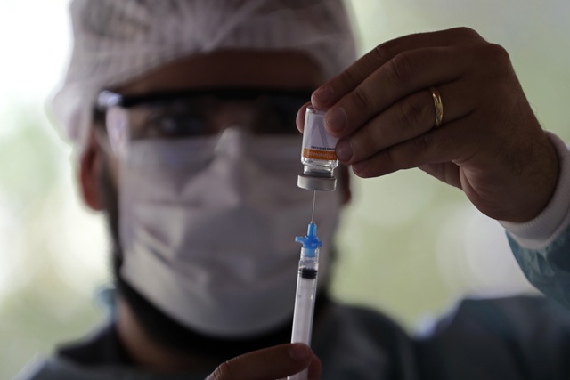 Thái Lan cấp phép sử dụng khẩn cấp vaccine COVID-19 của Sinovac - Ảnh 1.