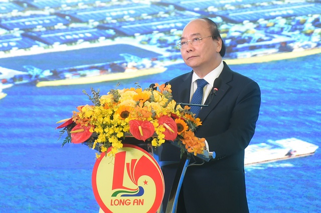 Thủ tướng dự khánh thành Khu công nghiệp Cầu cảng Phước Đông tại Long An - Ảnh 1.
