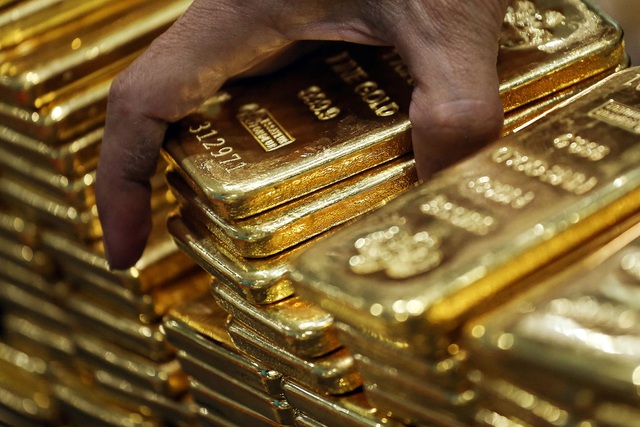Giá vàng đảo chiều tăng gần 200.000 đồng/lượng - Ảnh 1.