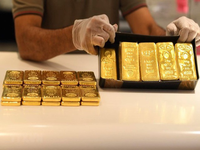Giá vàng tăng vọt, vượt mốc 56 triệu đồng/lượng - Ảnh 2.