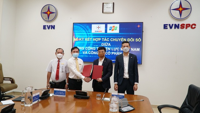 Tổng công ty Điện lực miền Nam (EVNSPC) ký hợp tác với FPT về chuyển đổi số - Ảnh 2.