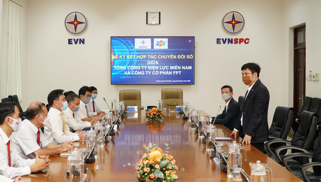 Tổng công ty Điện lực miền Nam (EVNSPC) ký hợp tác với FPT về chuyển đổi số - Ảnh 1.