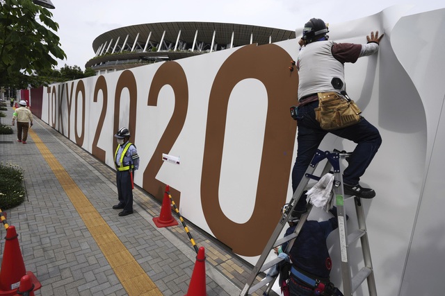 Nhật Bản hủy các sự kiện xem Olympic, Paralympic 2020 công cộng - Ảnh 1.
