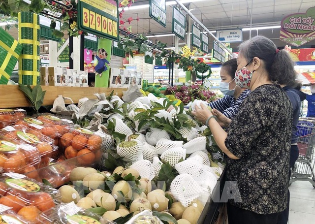 Siêu thị tăng lượng hàng hóa khi TP Hồ Chí Minh nâng mức giãn cách - Ảnh 1.
