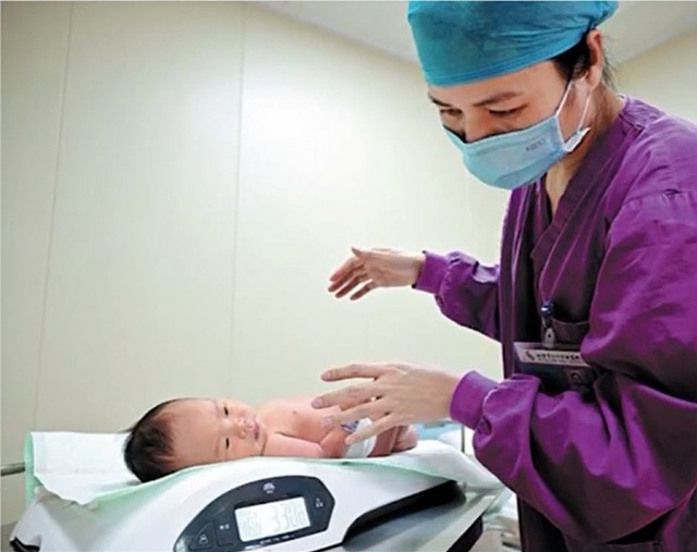 Trung Quốc chính thức cho phép sinh ba con - Ảnh 1.