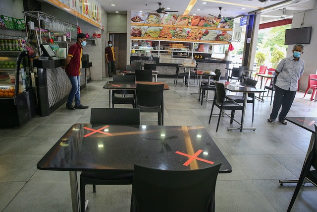 Malaysia: Các nhà hàng chưa muốn mở cửa trở lại do lo ngại dịch COVID-19 - Ảnh 1.