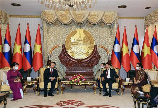 Chủ tịch nước Nguyễn Xuân Phúc thăm hữu nghị chính thức Lào - Ảnh 3.