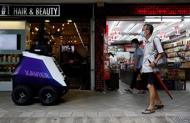 Singapore sử dụng robot để giám sát tuân thủ phòng dịch - Ảnh 1.