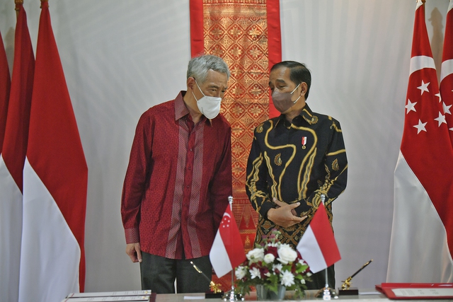 Indonesia - Singapore ký kết hiệp định dẫn độ - Ảnh 1.