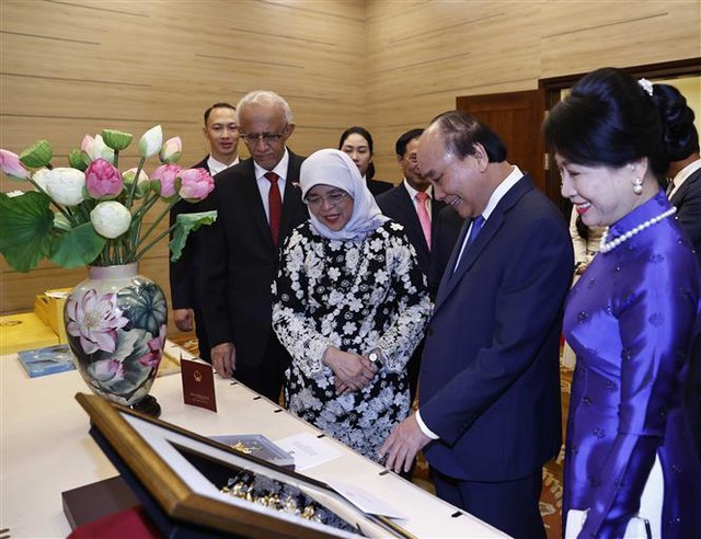 Chủ tịch nước và Phu nhân chủ trì tiệc chiêu đãi chào mừng Tổng thống Singapore và Phu quân - Ảnh 8.