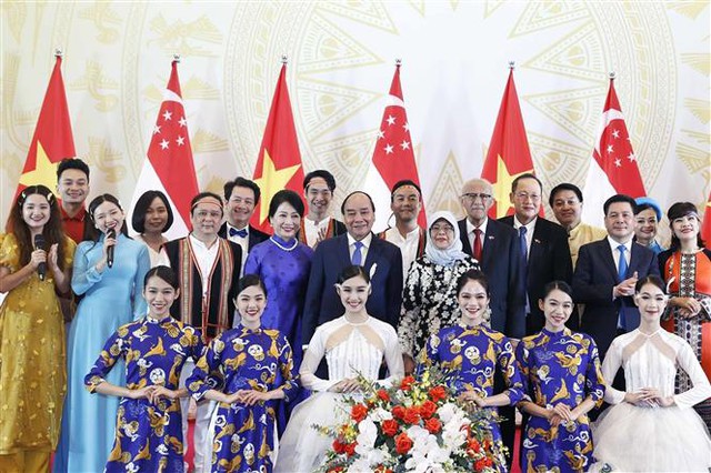 Chủ tịch nước và Phu nhân chủ trì tiệc chiêu đãi chào mừng Tổng thống Singapore và Phu quân - Ảnh 7.