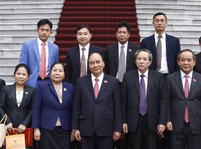 Chủ tịch nước Nguyễn Xuân Phúc tiếp Trưởng Ban Tổ chức Trung ương Đảng Nhân dân Cách mạng Lào - Ảnh 5.