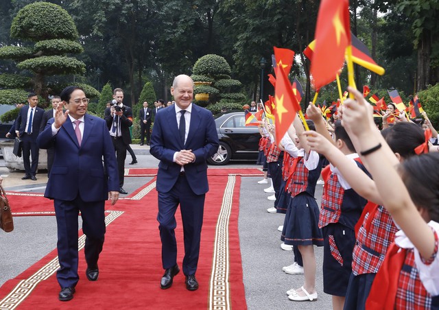 Lễ đón Thủ tướng Cộng hòa Liên bang Đức thăm chính thức Việt Nam - Ảnh 2.