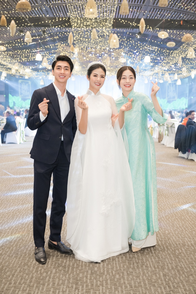 Sao Việt đồng loạt diện áo dài dự đám cưới Hoa hậu Ngọc Hân - Ảnh 8.