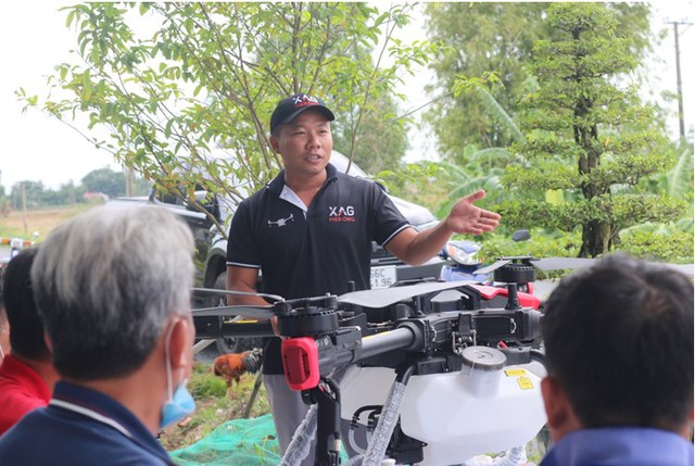 Drone XAG cùng nông dân trồng lúa Việt Nam gia tăng thu nhập - Ảnh 1.