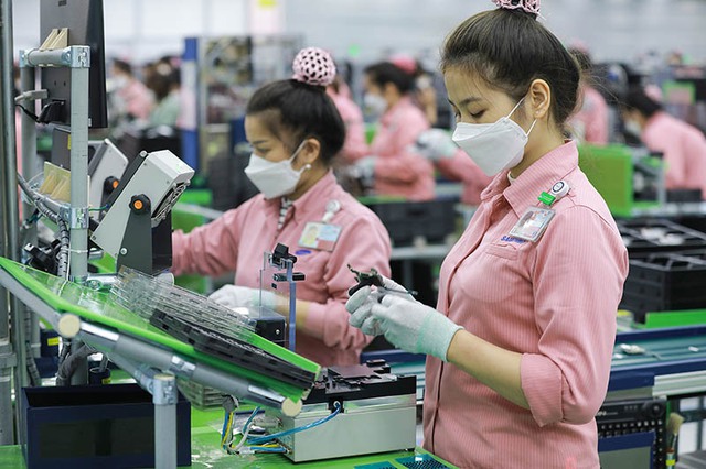 Việt Nam trên đà thành trung tâm sản xuất toàn cầu mới - Ảnh 1.