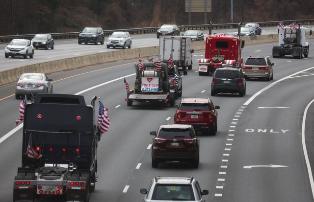 Hàng loạt phương tiện tuần hành quanh Washington, đe dọa gây tắc nghẽn giao thông - Ảnh 1.