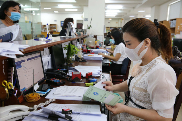 Tinh giản biên chế: Bộ máy không còn phình ra nhưng vẫn chưa tương xứng với đầu tư - Ảnh 4.