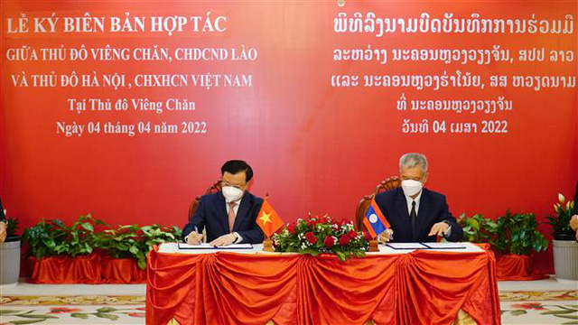 Hà Nội và và Thủ đô Vientiane (Lào) ký kết thỏa thuận hợp tác song phương - Ảnh 4.
