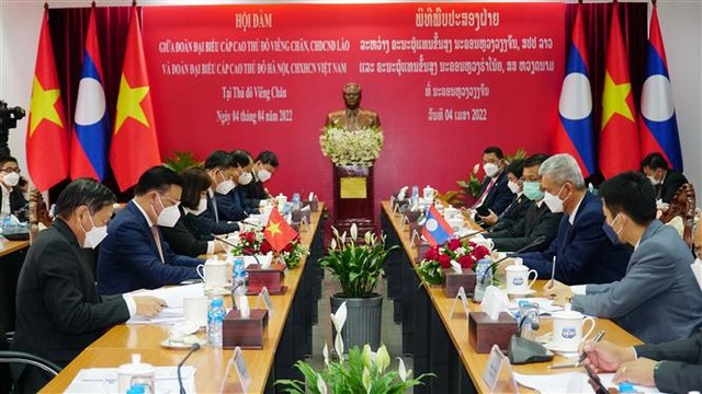 Hà Nội và và Thủ đô Vientiane (Lào) ký kết thỏa thuận hợp tác song phương - Ảnh 2.