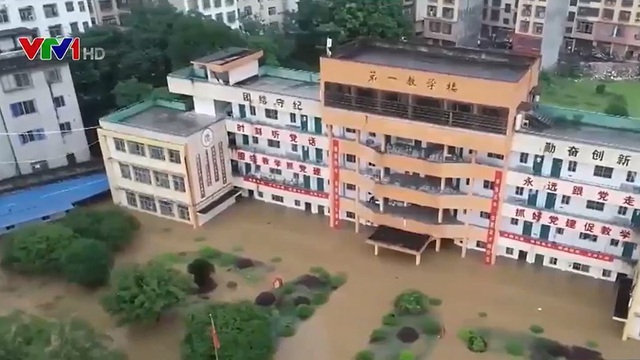 Trung Quốc phát cảnh báo cao nhất về mưa lớn - Ảnh 1.