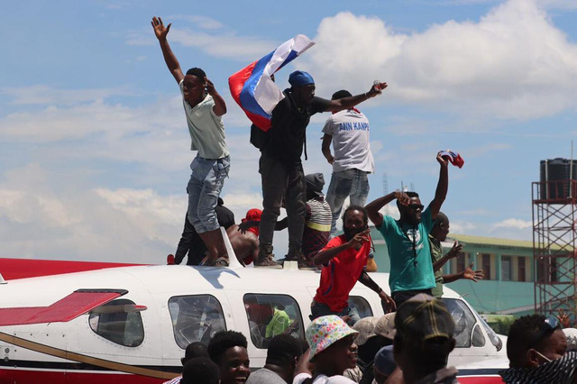 Hàng trăm người chết, bị thương hoặc mất tích trong làn sóng bạo lực băng đảng ở Haiti - Ảnh 1.