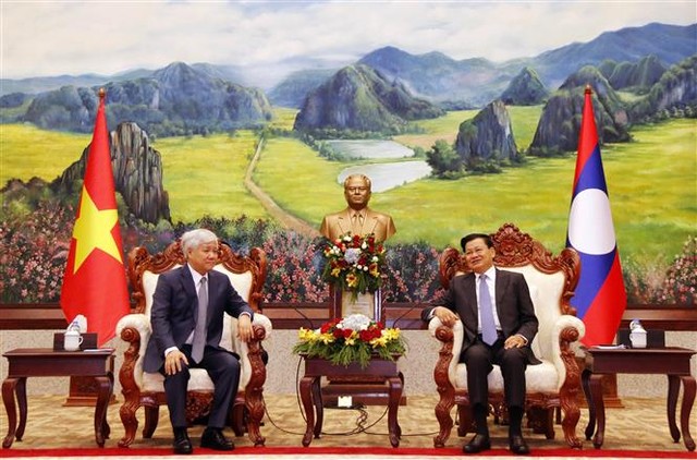 Vun đắp mối quan hệ vĩ đại Việt Nam - Lào - Ảnh 1.