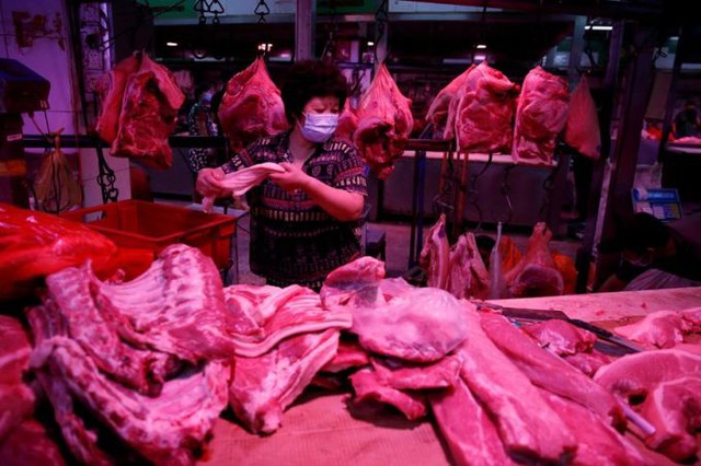 Giá thịt lợn tại Trung Quốc tăng đột biến - Ảnh 1.