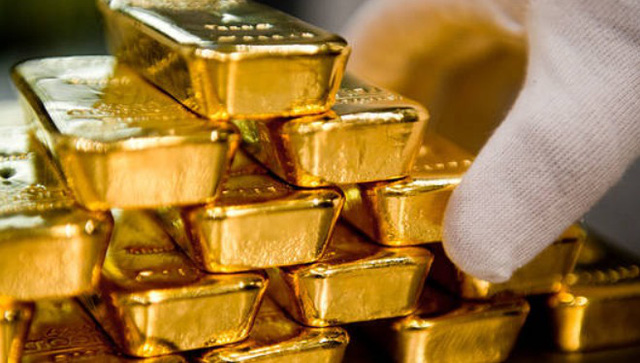 Giá vàng tiếp đà tăng khi USD suy yếu - Ảnh 1.