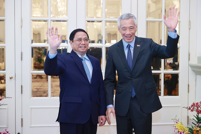 Lễ đón chính thức Thủ tướng Phạm Minh Chính thăm chính thức Cộng hòa Singapore - Ảnh 2.