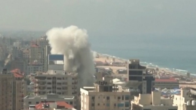 Bạo lực bùng phát dữ dội tại Dải Gaza - Ảnh 1.