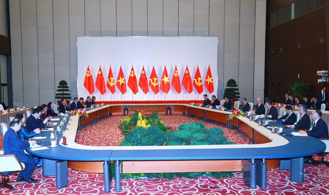 Thường trực Ban Bí thư Trương Thị Mai hội đàm với Ủy viên Thường vụ Bộ Chính trị Đảng Cộng sản Trung Quốc - Ảnh 1.