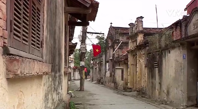 Người dân giữ văn hóa kiến trúc làng Việt - Ảnh 1.