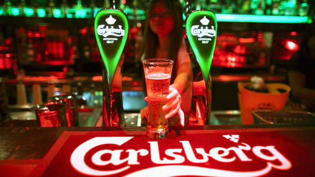 Hãng bia Đan Mạch Carlsberg thoái vốn khỏi Nga - Ảnh 1.
