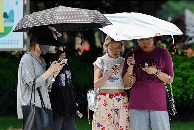 Nhiều thành phố của Trung Quốc kêu gọi tiết kiệm điện vì quá tải do nắng nóng - Ảnh 1.