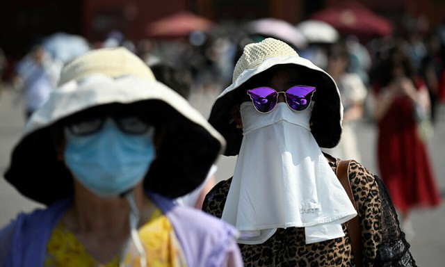 Bắc Kinh hứng chịu nắng nóng cực độ trong ngày thứ ba liên tiếp - Ảnh 1.
