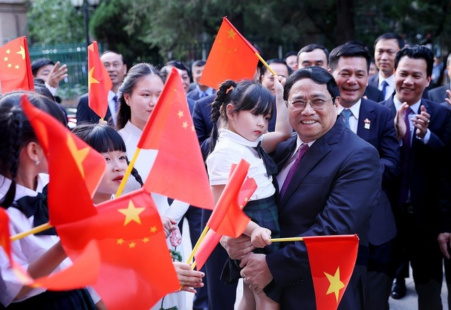 Thủ tướng: Mong kiều bào luôn là cầu nối hiệu quả cho quan hệ Việt Nam - Trung Quốc - Ảnh 1.