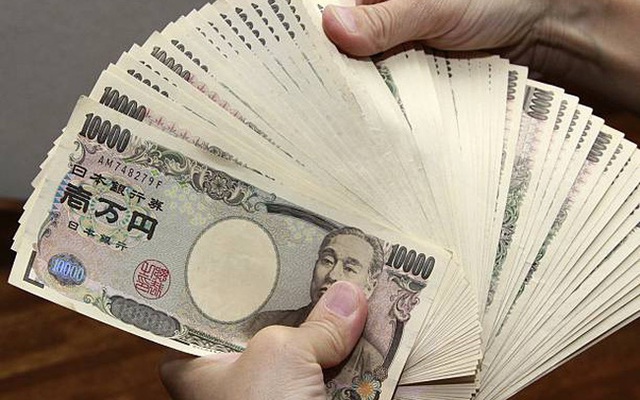 Đồng Yen tiếp tục mất giá so với USD - Ảnh 1.