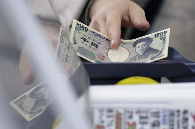 Đồng Yen tiếp tục đối mặt với xu hướng mất giá - Ảnh 1.