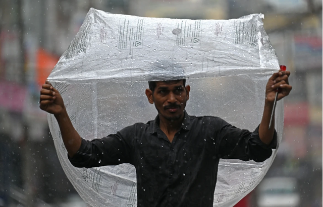Mưa lớn gây lũ lụt, sạt lở đất tại Ấn Độ, khiến hàng chục người thiệt mạng - Ảnh 9.