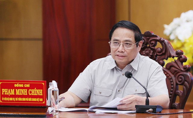 Thủ tướng Phạm Minh Chính: Long An tận dụng lợi thế là nơi giao thoa, kết nối các trục, hành lang kinh tế để phát triển - Ảnh 1.